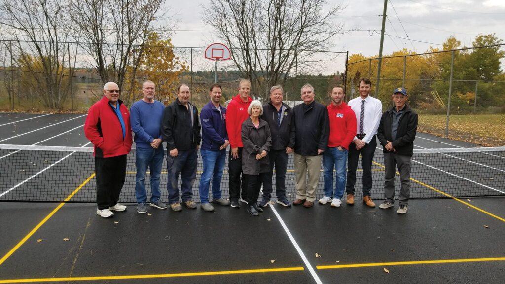 Present at the opening of the multi-use courts near Pontiac High: (L-R): Eric Smith (Mun. Clarendon); Bill McCleary (Mayor Shawville); Frank Frost (WQSB maintenance); Julien Gagnon (Mun. Shawville recreation committee); Chad Davis (PHS teacher); Mary Ann Abrams (Shawville Pickleball Club); Steve Sutton (Shawville Lions); Terry Burns (Principal PHS); Darcy Findlay (PHS teacher); Luke McLaren (Vice-Principal PHS); Albert Arnstrong (Shawville Rotary Club).